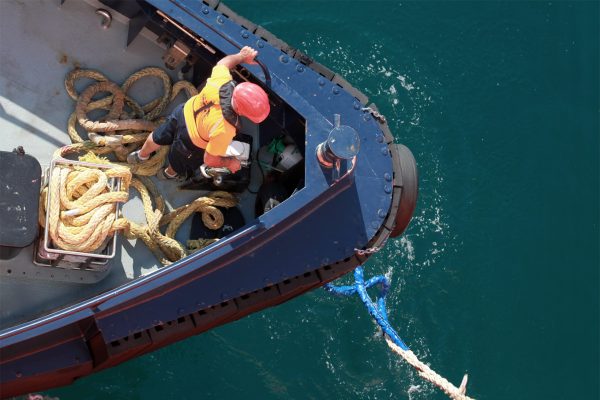 Birds eye view of a Marine Operator working on a boat